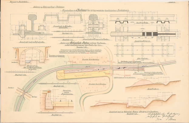 Altes Buch mit detaillierten Zeichnungen und Text zu einem Eisenbahnlayout, einschließlich einer Illustration einer Eisenbahnschiene.