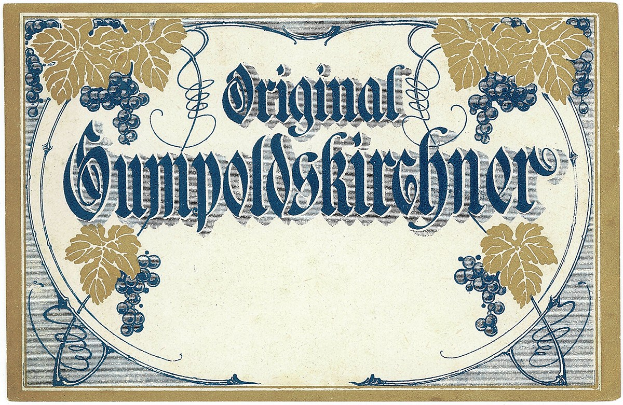 Alte deutsche Wein-Etikett mit einer Illustration von Trauben und Blättern mit Text, der den Wein-Typ angibt.