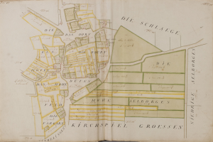 Ein altes Buch mit einer detaillierten Karte von Hamburg, Deutschland, einschließlich Straßen, Gebäuden und Sehenswürdigkeiten, begleitet von Text, der zusätzliche Informationen über die Stadt bereitstellt.